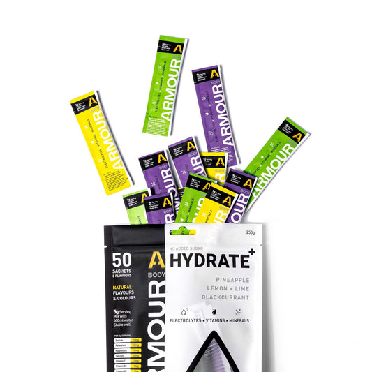 Armour Hydrate packets with various flavors on a white background